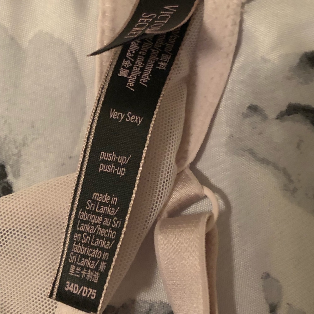 Victoria’s Secret Bombshell bra blush/nude lace.